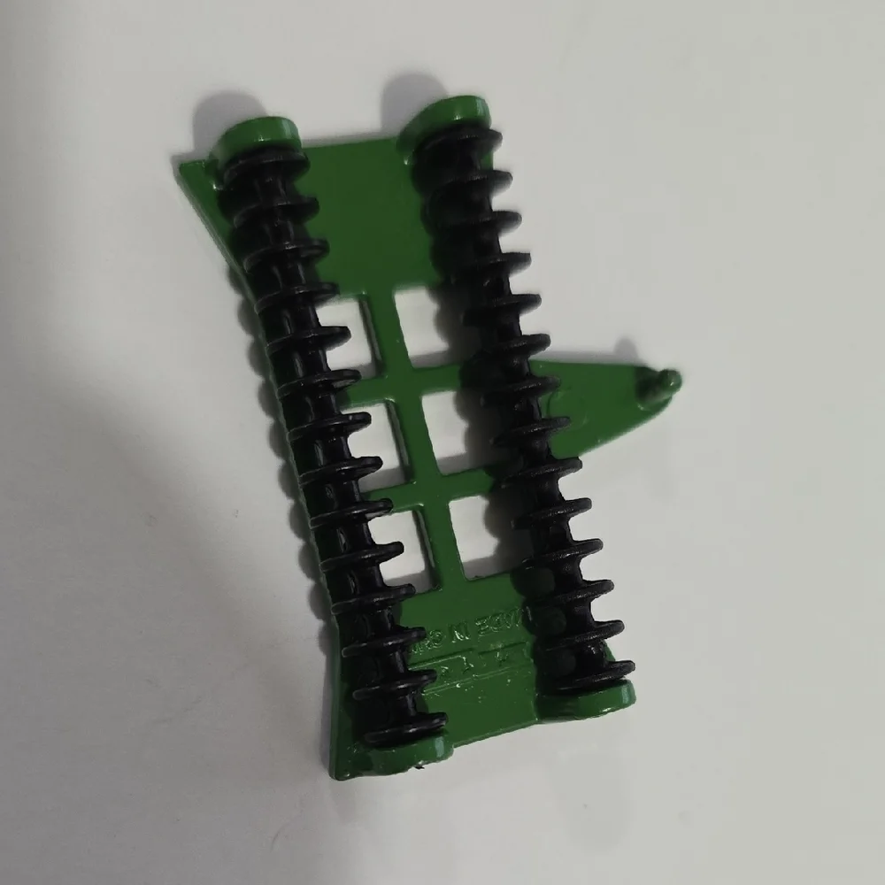 Toy John Deere combine corn head, likely an Ertl 1/64 scale model.
